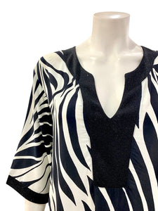 ABITO LUREX BIANCO NERO